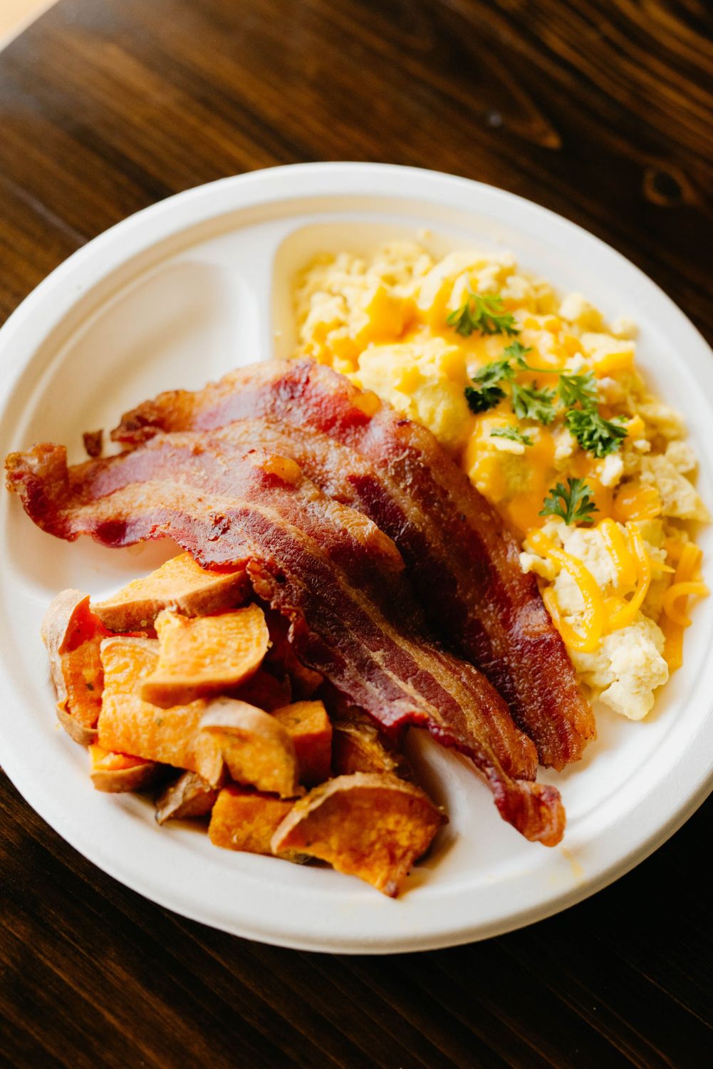 Iron skillet breakfast plate with eggs, bacon, and toast