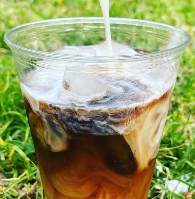 Humble Crumb iced coffee topped with cream